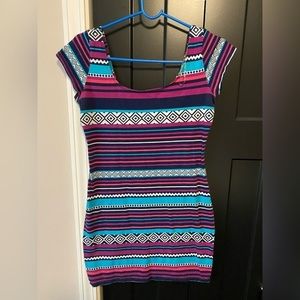 Short stretchy dress. Size large. Scoop neck. Vibrant colors.